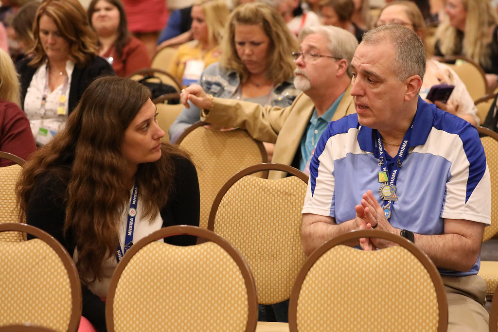 People talking at a conference